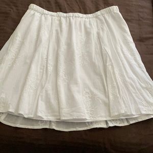 Knee-length, white embroidered skirt; lightly worn; size 18